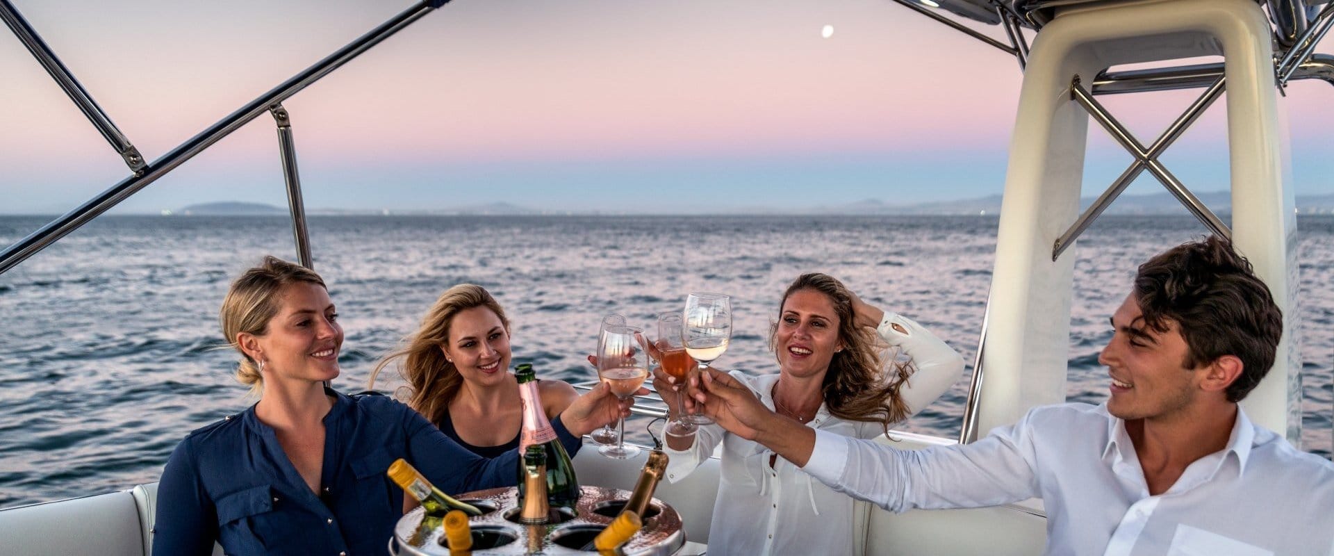 guests enjoying champagne on a bareboat charter Seychelles